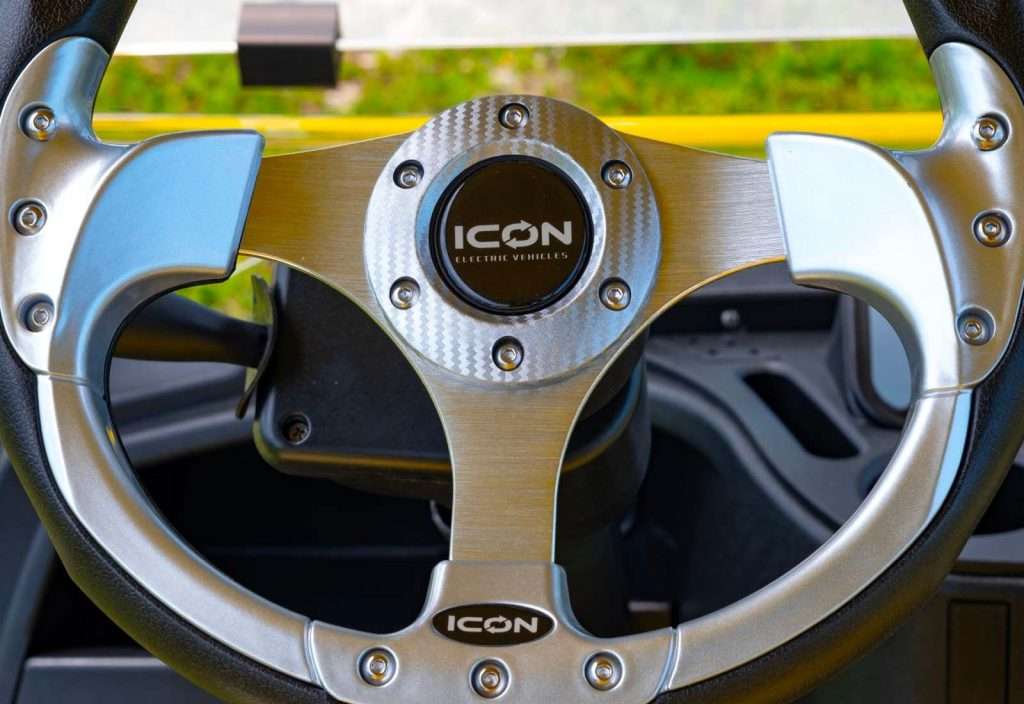 Close-up of an ICON steering wheel in a vehicle.