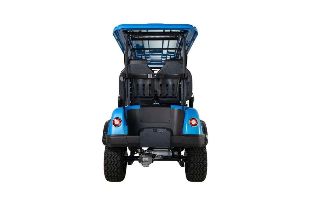 Rear view of a blue golf cart with black seats and a roof.