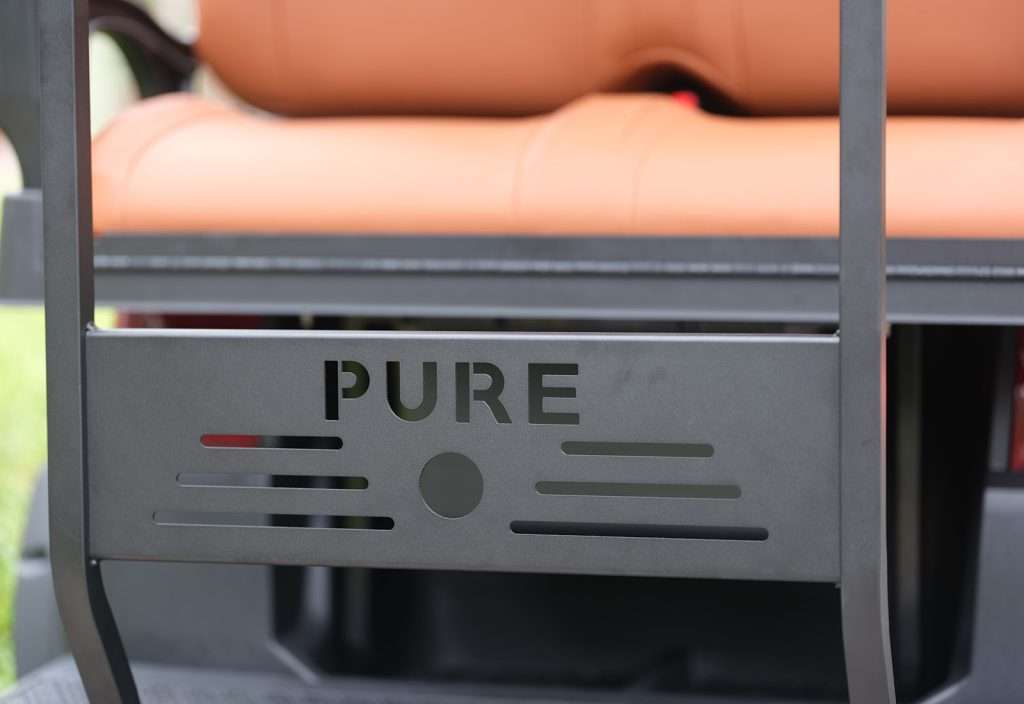 Close-up of a grill with the brand name PURE.
